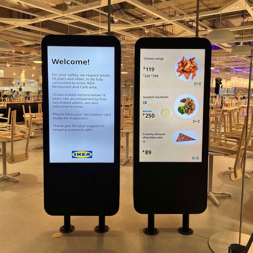 Digital kiosks showing the restaurant menu and prices at IKEA Philippines